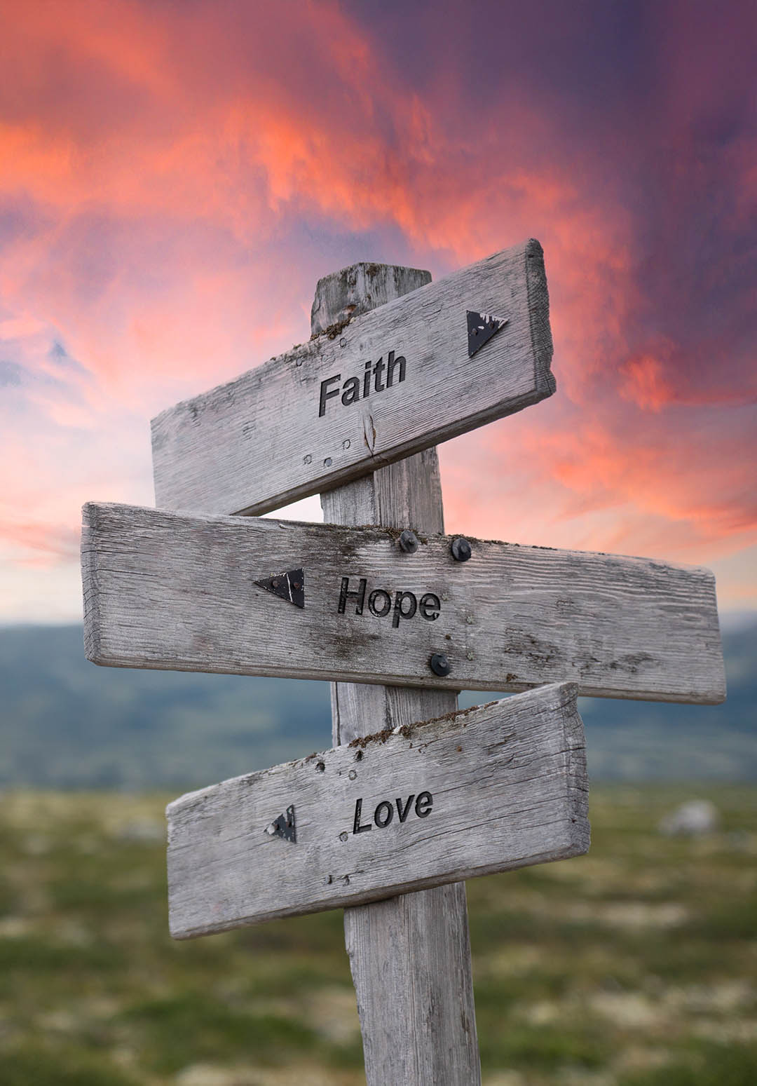 signposts signposts depicting faith, hope and love paths